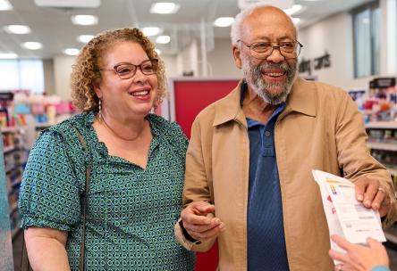 A man and a woman at a pharmacy