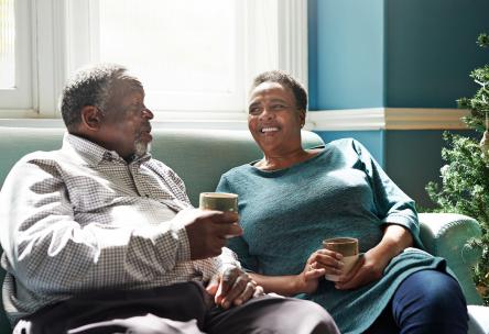 Senior couple relaxing on the couch together